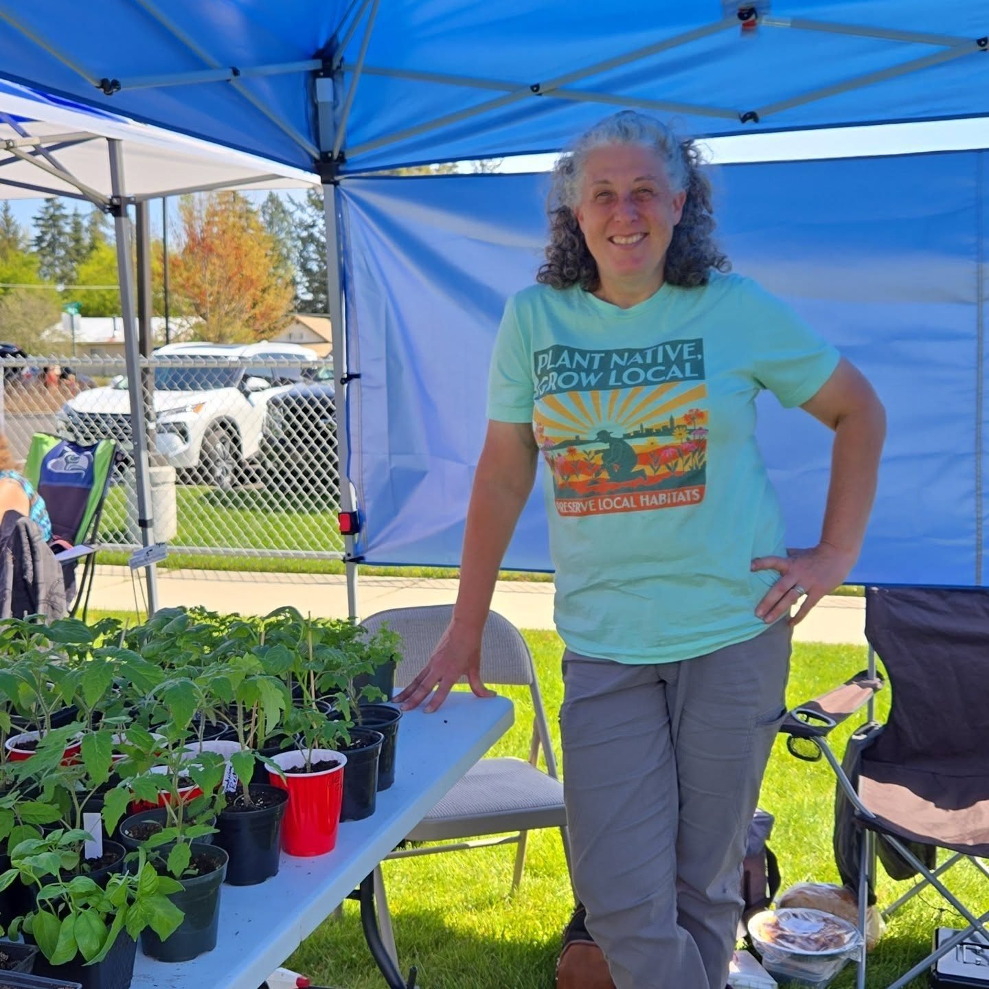 Tina at the market booth